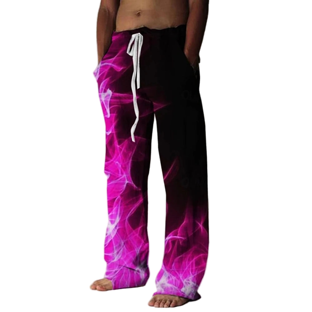 Person wearing a pair of vibrant pink and black pants with a white drawstring against a plain background.