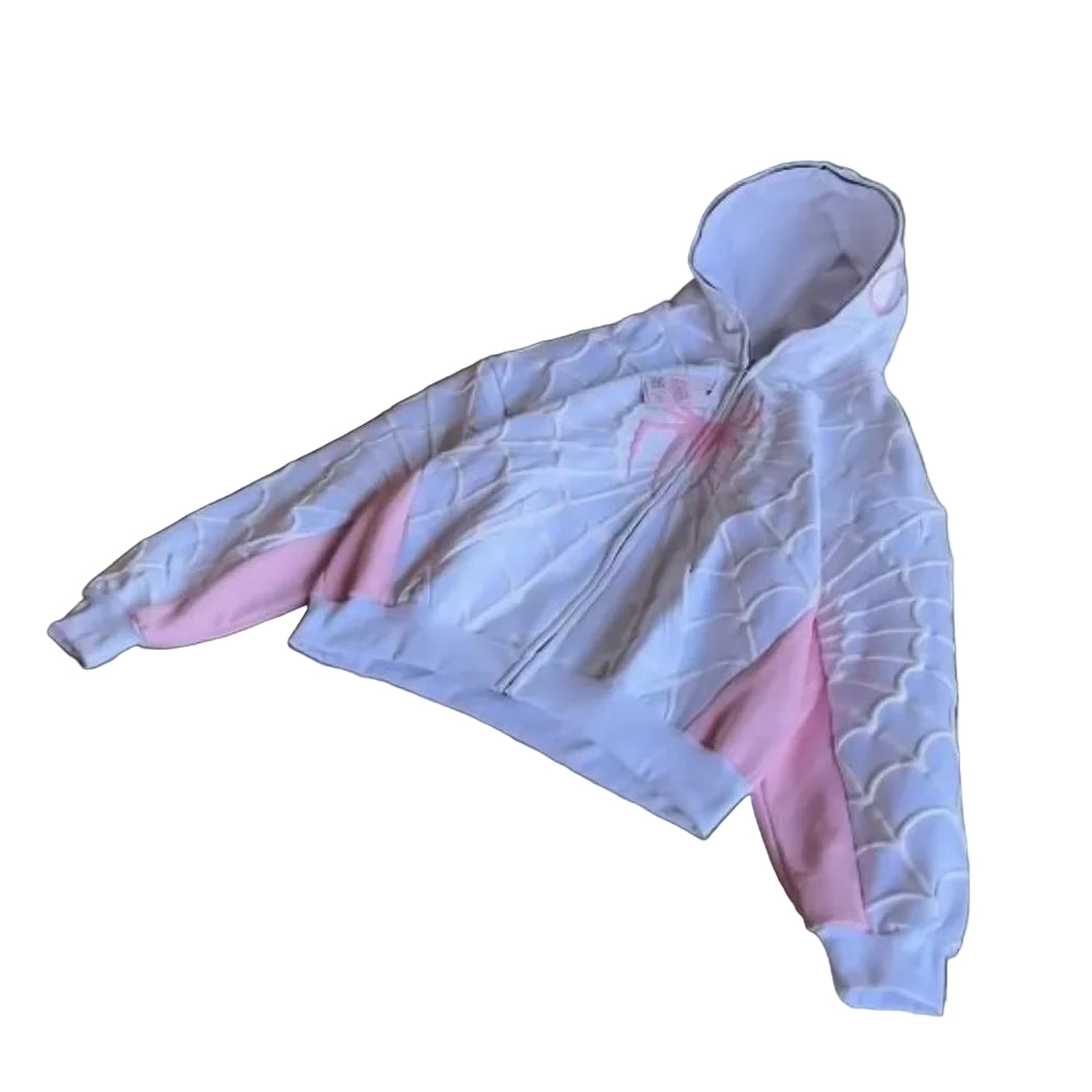 White and pink fabric item on a textured surface