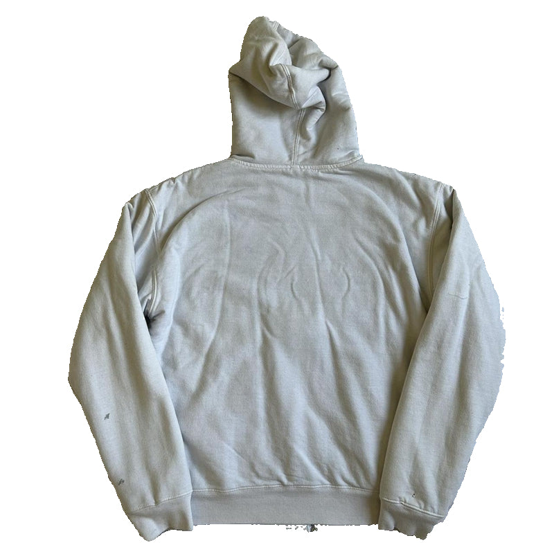 Light gray hoodie on a white sheet