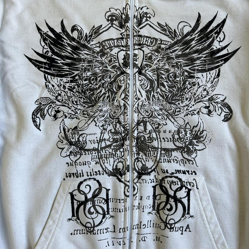 White hoodie with black intricate design featuring wings and text on a white background