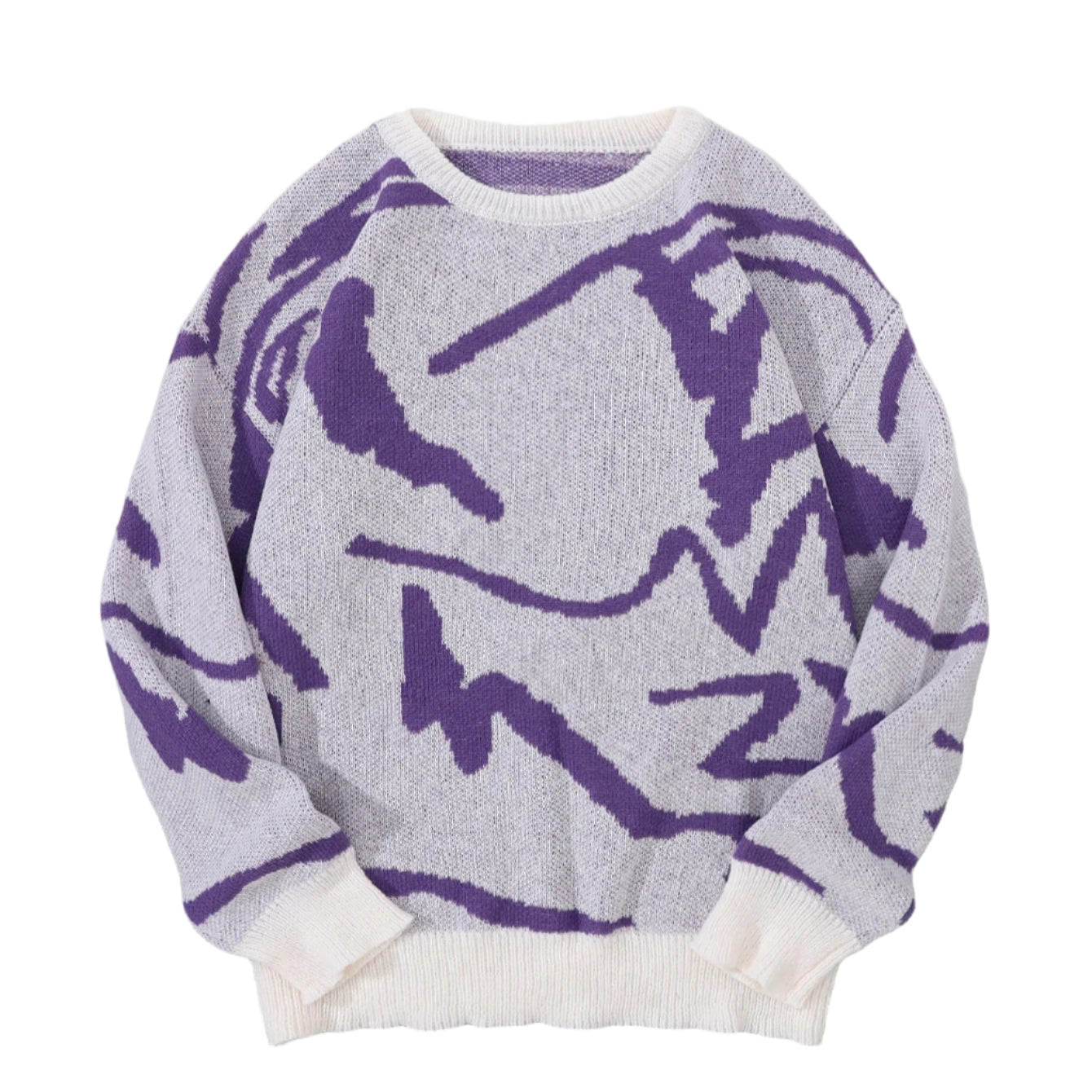 Gray sweater with purple abstract patterns on a gray surface with white shoes and a white blanket in the background.