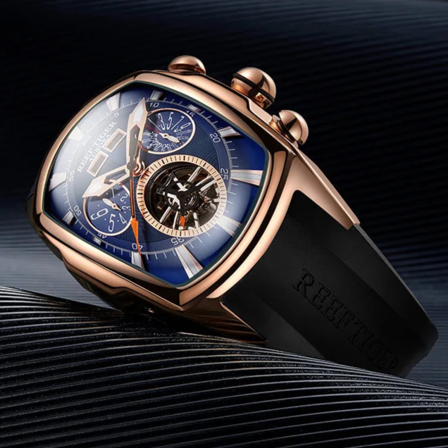 Two views of a luxury watch with rose gold case and black strap on a dark background.
