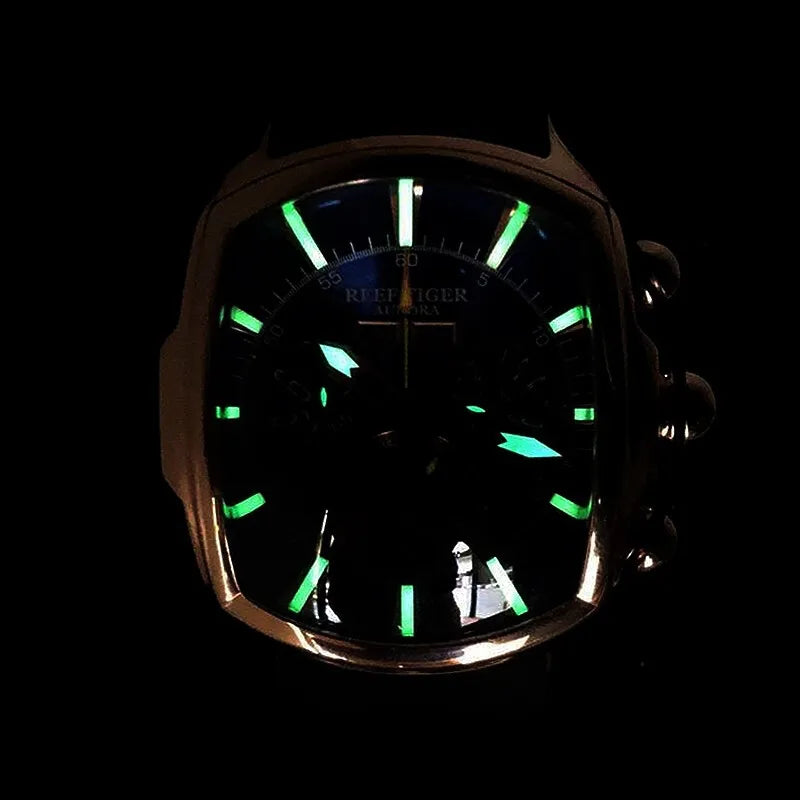 Watch with glowing green markers on a black background