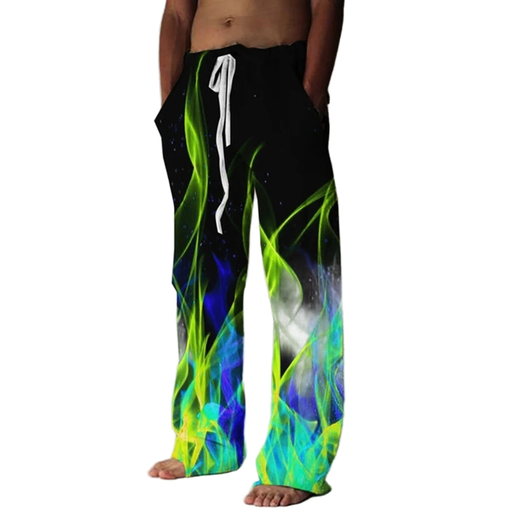 Person wearing colorful pants with flame design against a plain background