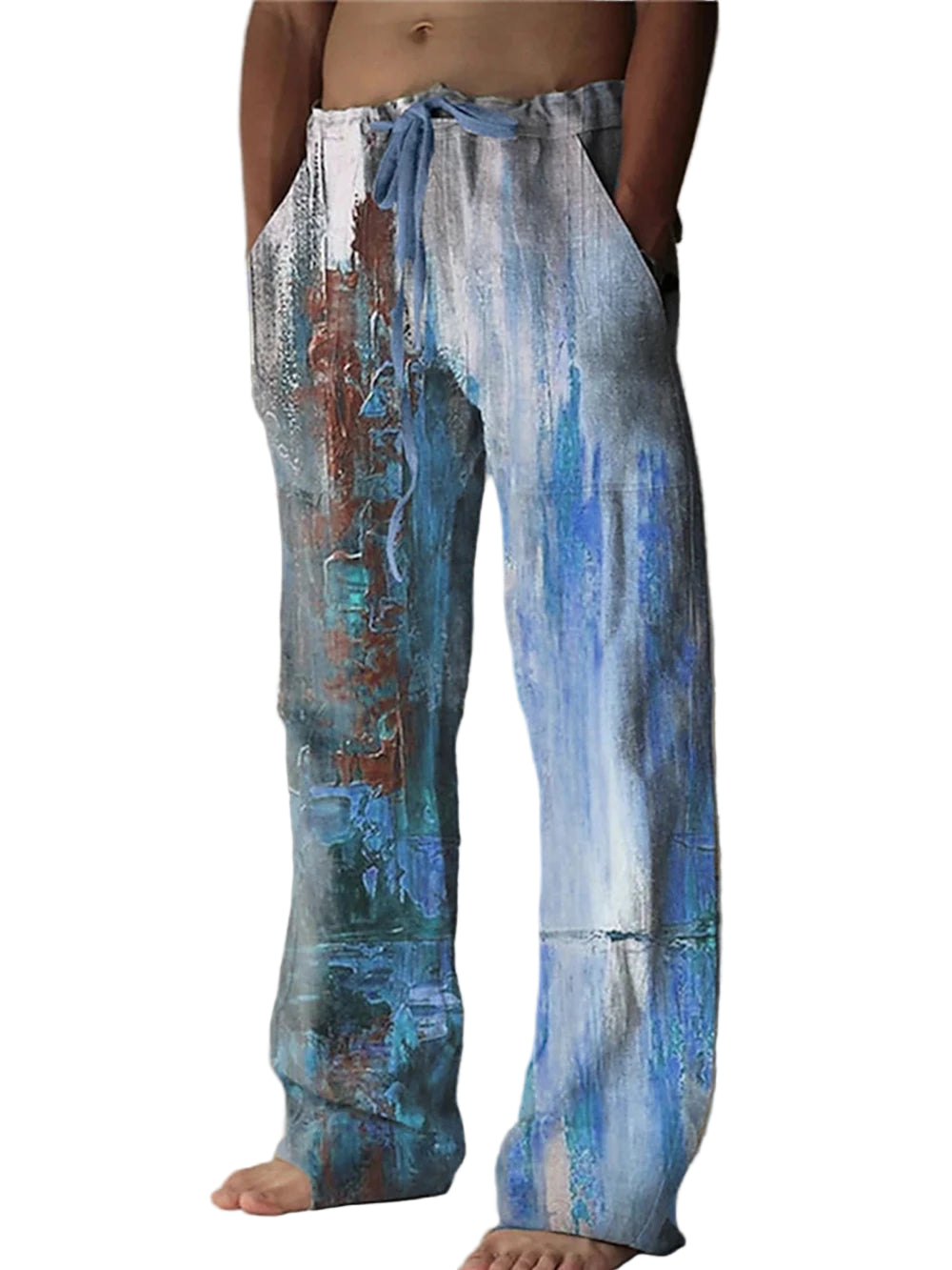 Person wearing a pair of colorful, abstract-patterned pants on a plain background