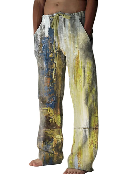 Person wearing a pair of colorful, abstract-patterned pants on a plain background