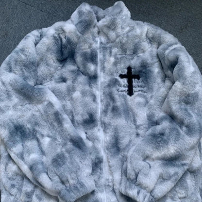 Gray fleece jacket with a black cross emblem on a dark background