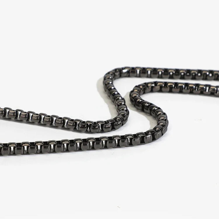 Black metal chain on a white background