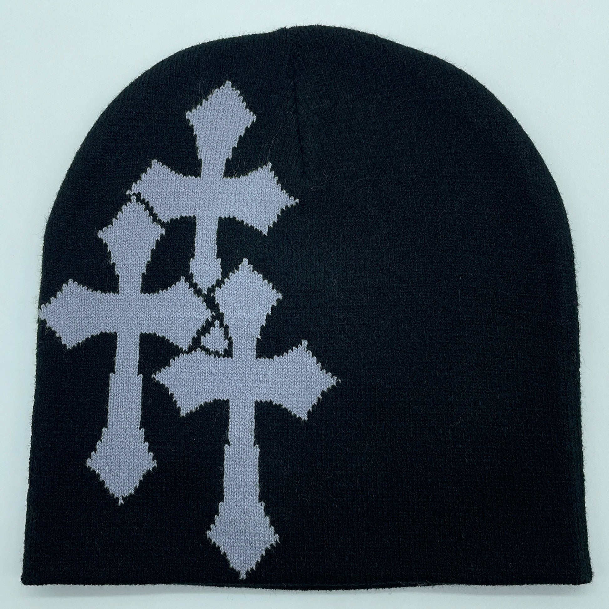 Black beanie with silver cross design on a light gray background