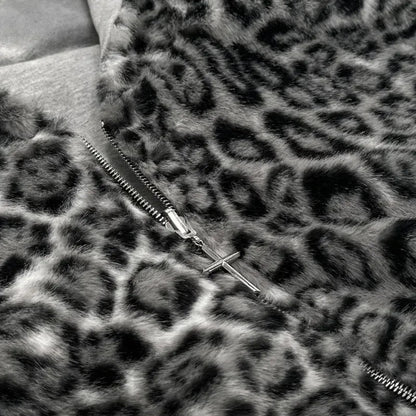 Close-up of a zipper on a leopard print fabric background
