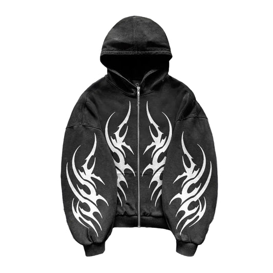 Black hoodie with white tribal designs on a gray background