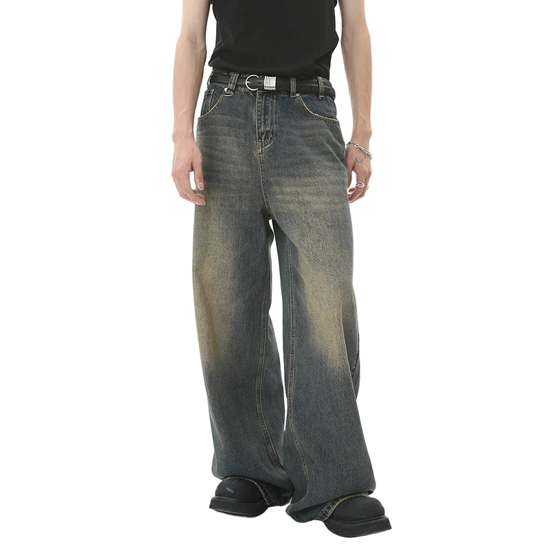 Person wearing wide-leg jeans with a visible brand logo on a white background