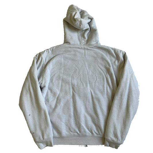 Light gray hoodie on a white sheet