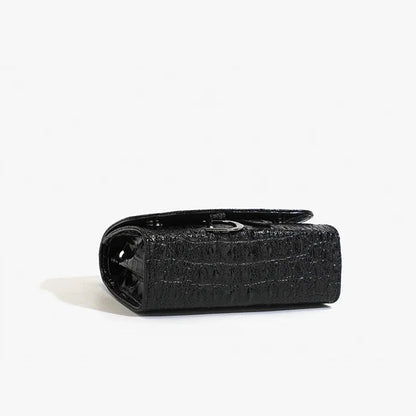 Black textured wallet on a white background