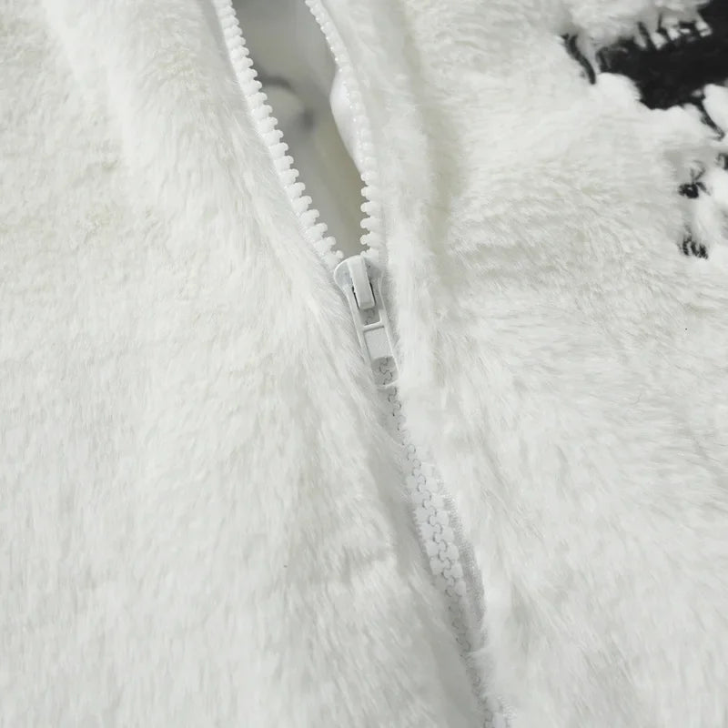 Close-up of a textured white fabric with a zipper