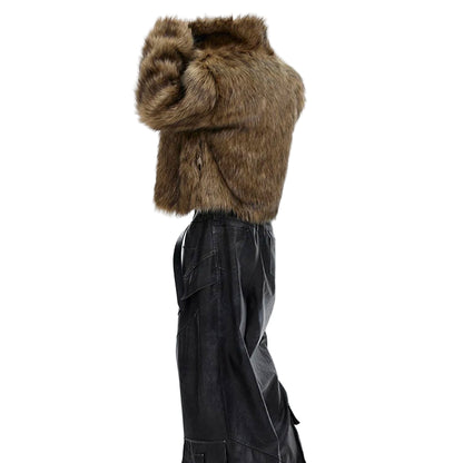 Dark coat with fur hood on a white background, featuring the brand 'mauroicardi'.