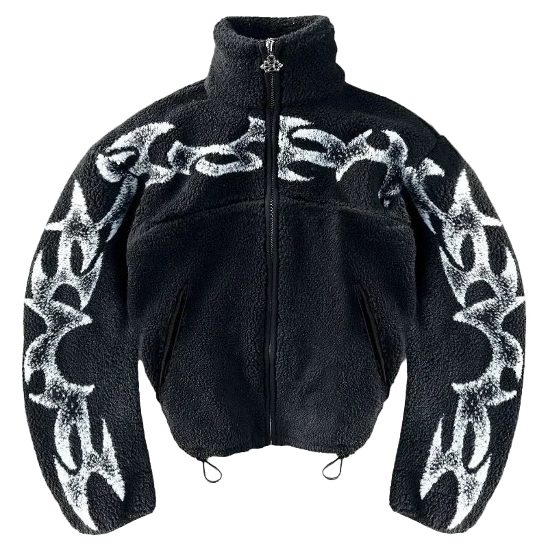 Black jacket with white tribal patterns on a gray concrete surface