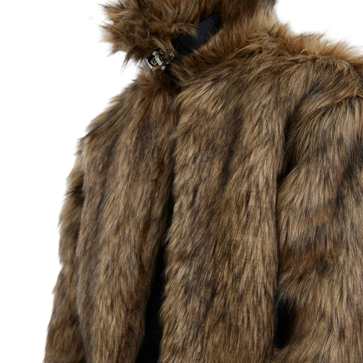 Close-up of a brown fur coat with 'mauroicardi' branding.