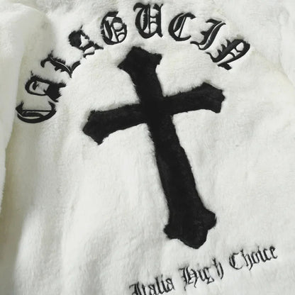 White garment with black cross design and 'Gucci' branding.