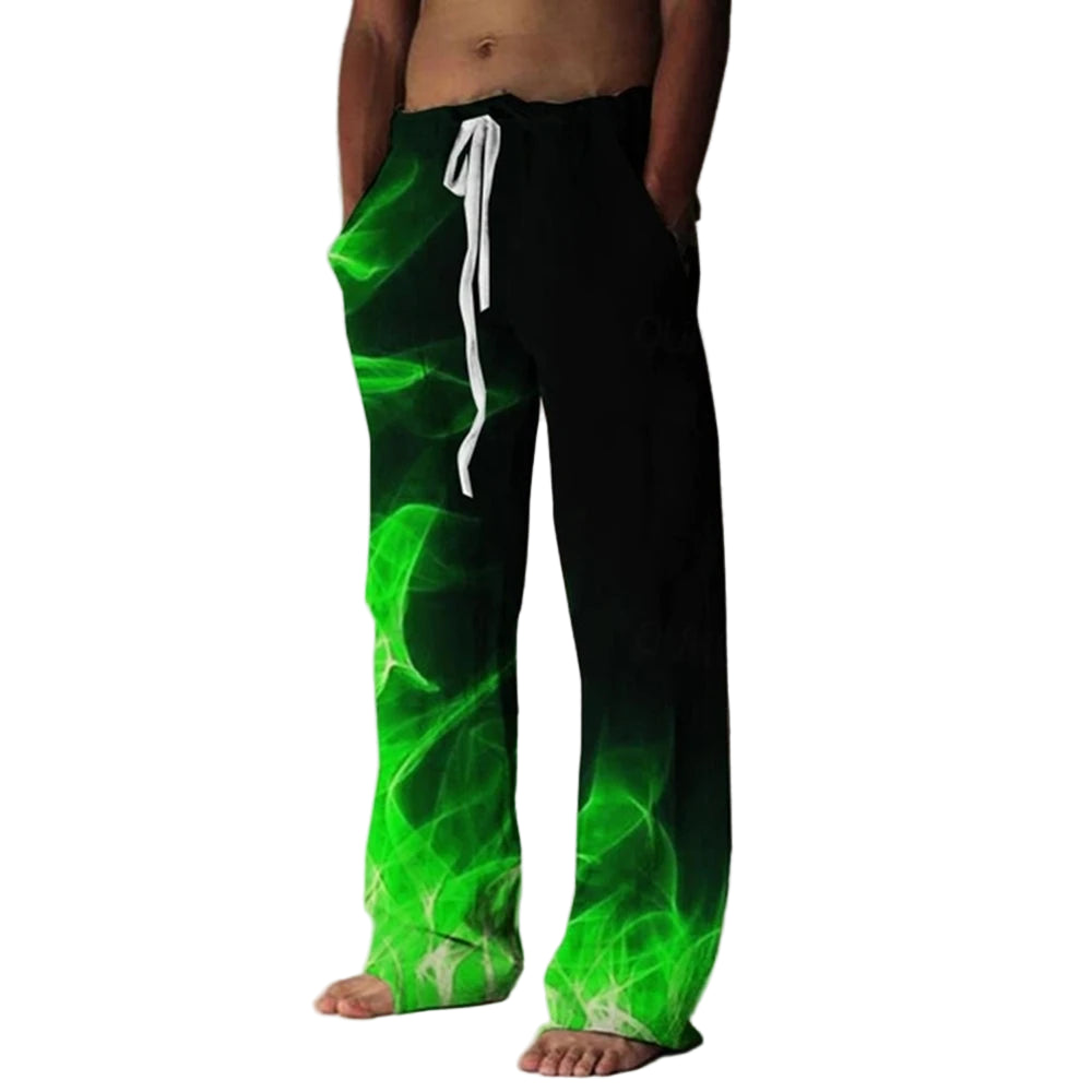 Person wearing black pants with green flame pattern and white drawstring.