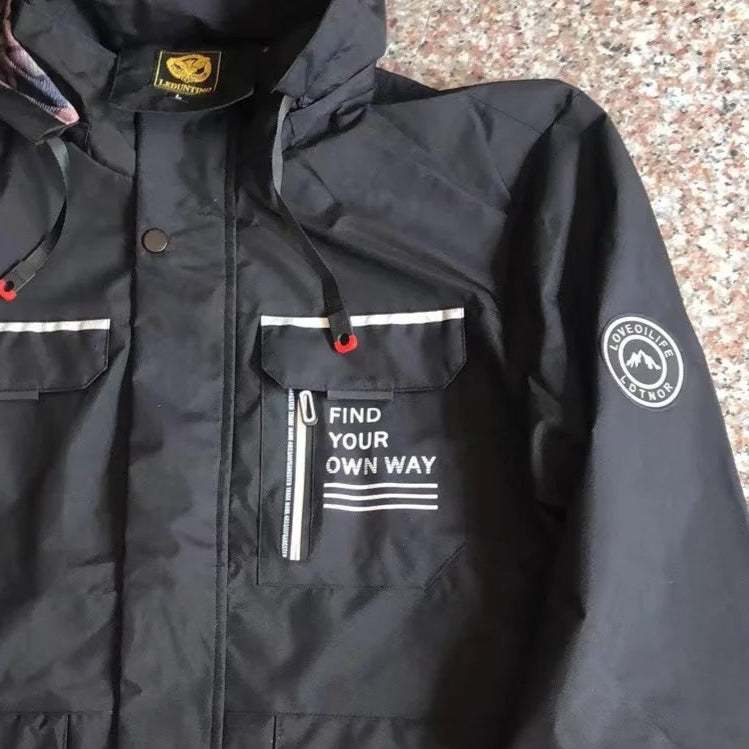 Black jacket with a pocket message on a textured surface