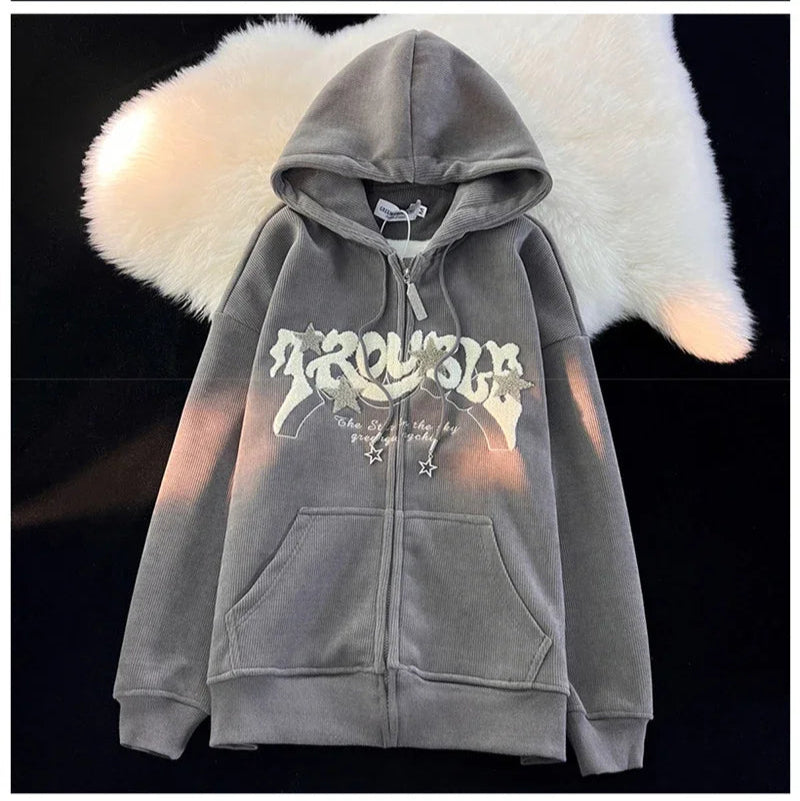Three hoodies with different designs on a white background