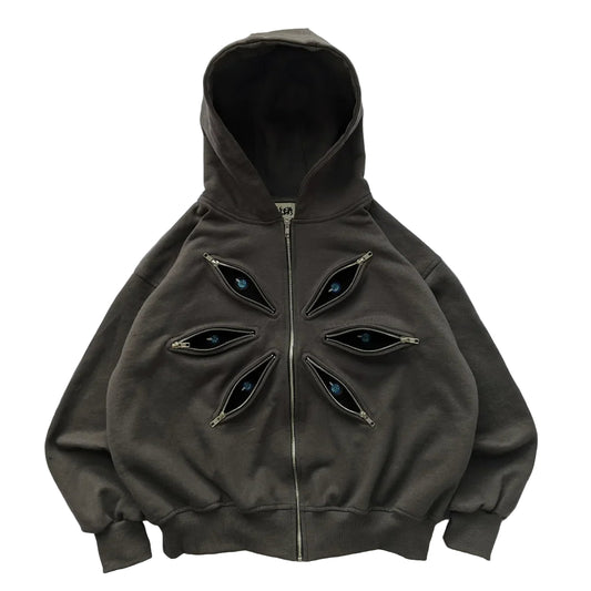Dark gray hoodie with eye-shaped zippers on a white background